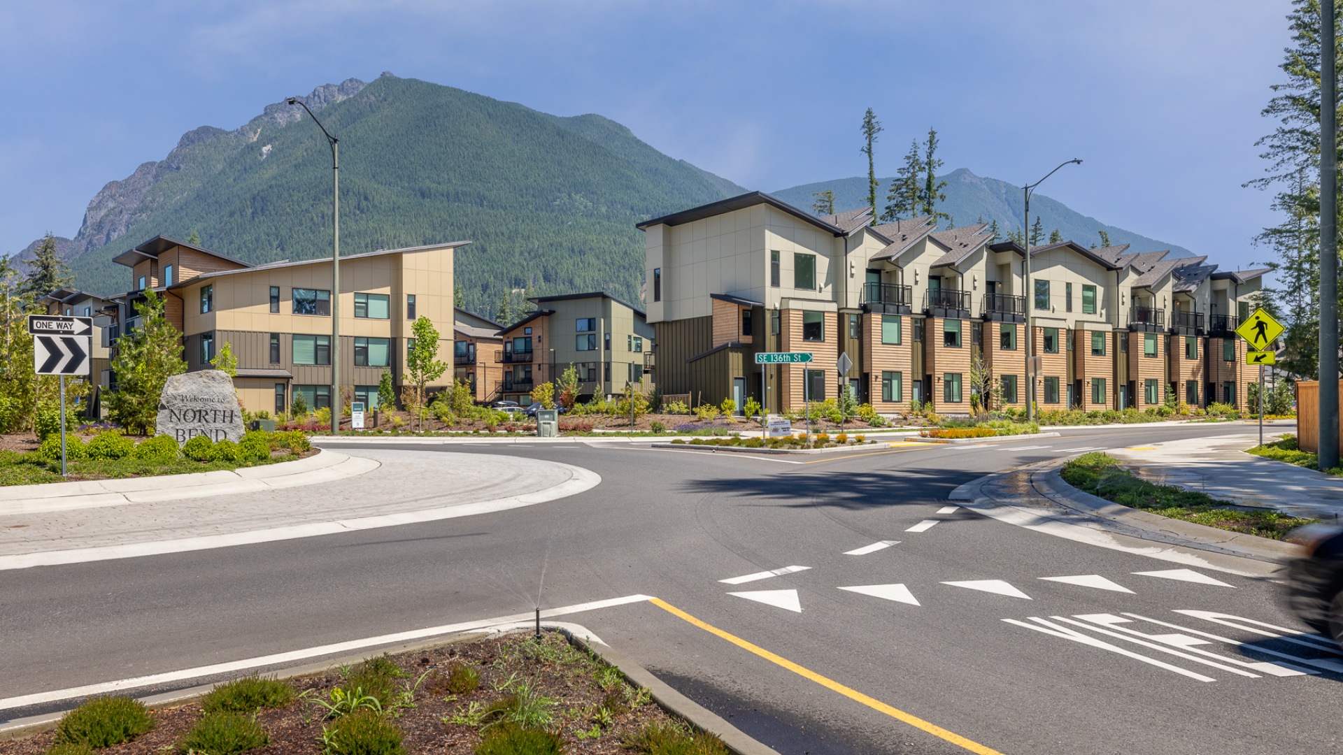 exterior view of homes with Mt. Si in background