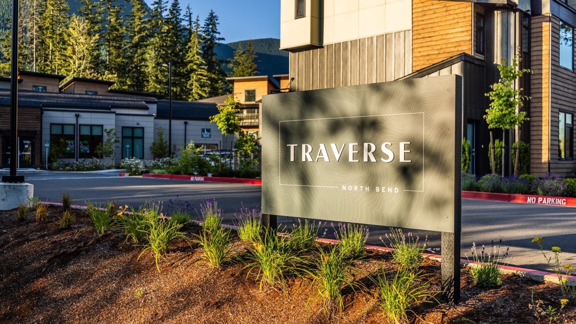 Signage for Traverse North Bend at Dusk